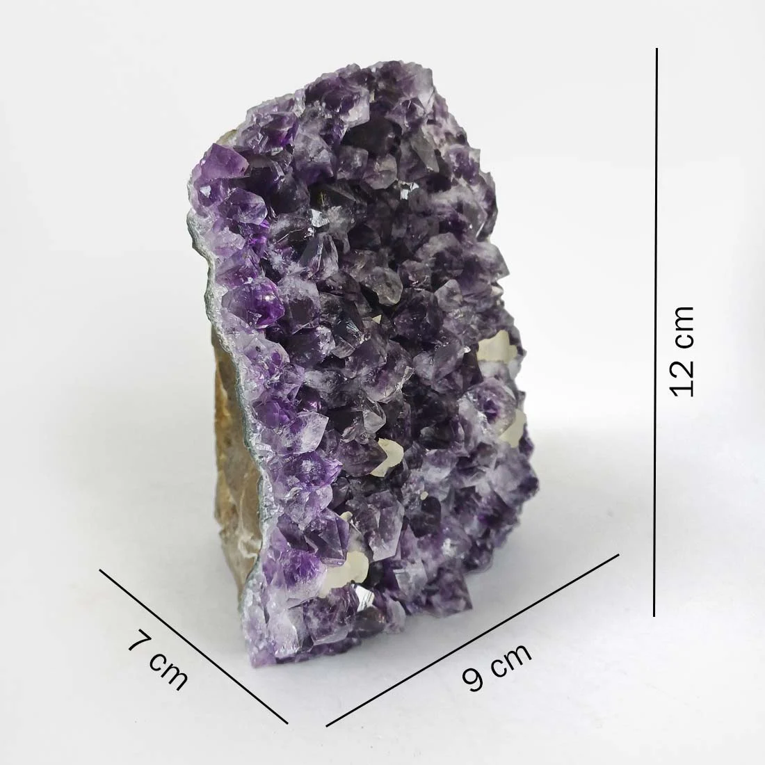 Premium Quality Amethyst Cluster from Uruguay with deep purple crystal points, freestanding flat-cut base, natural rough formation, healing crystal specimen for home décor, meditation space, and crystal collection.