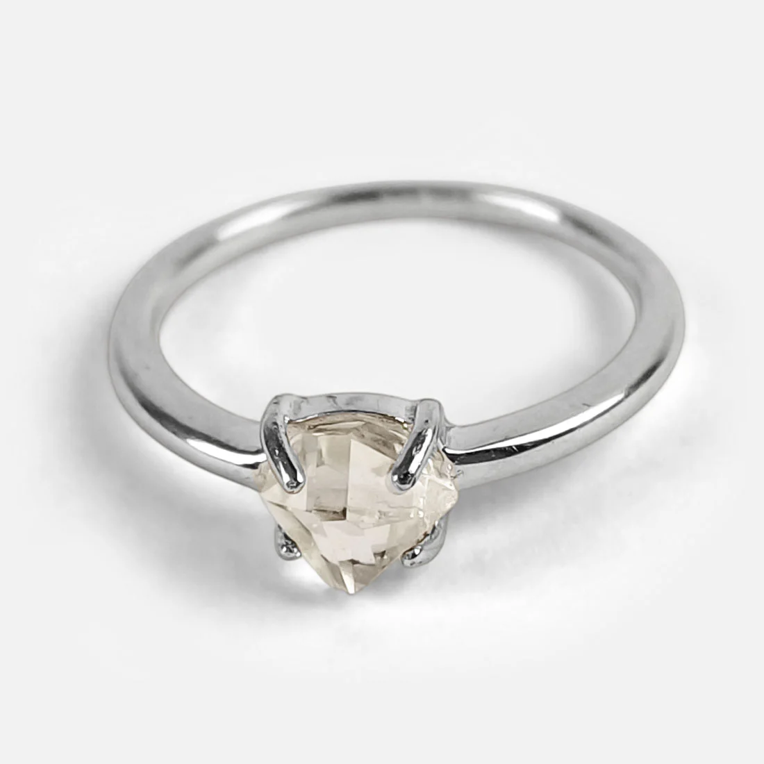 Sterling silver Herkimer diamond ring size 16 with faceted quartz crystal and plain bezel.