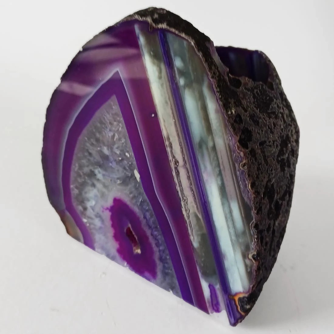 Bring warmth and harmony into your space with this agate candle holder. Its natural bands glow beautifully when lit, creating a calming and protective atmosphere.