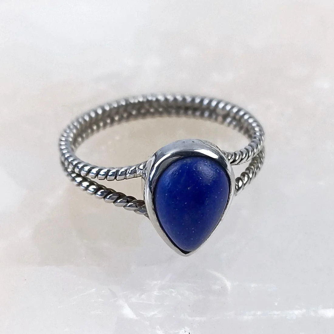 925 silver rope band ring featuring a natural lapis lazuli stone with deep blue color