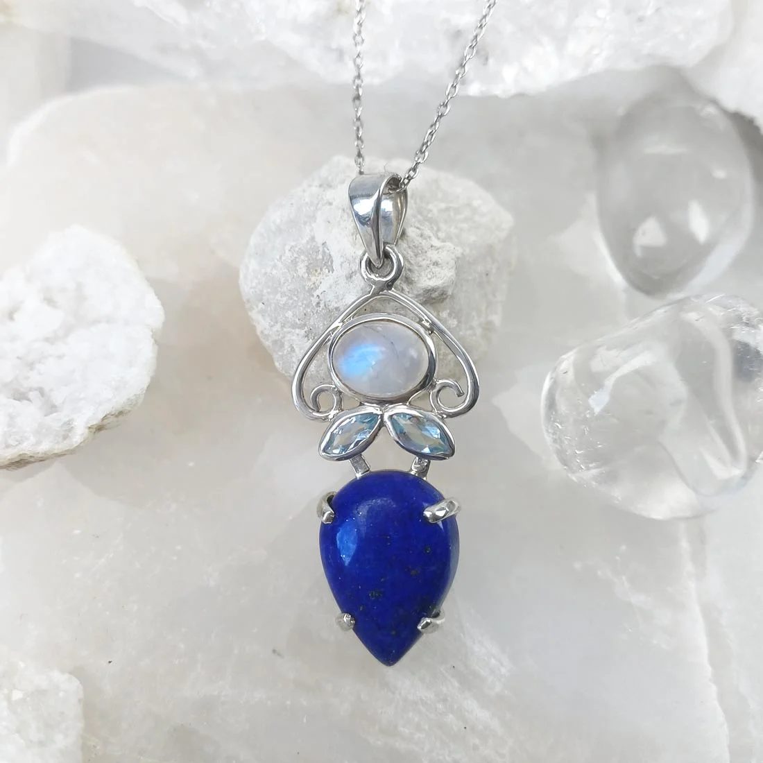 Blue Topaz, Lapis Lazuli, and Moonstone pendant set in 925 sterling silver.