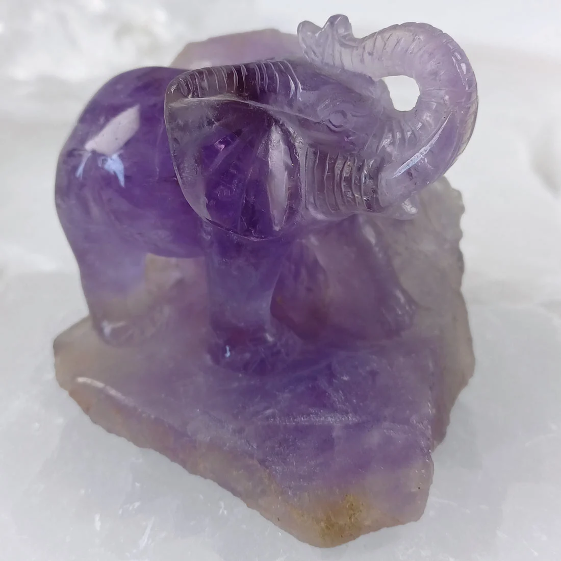 Amethyst Elephant Carving in natural amethyst crystal.