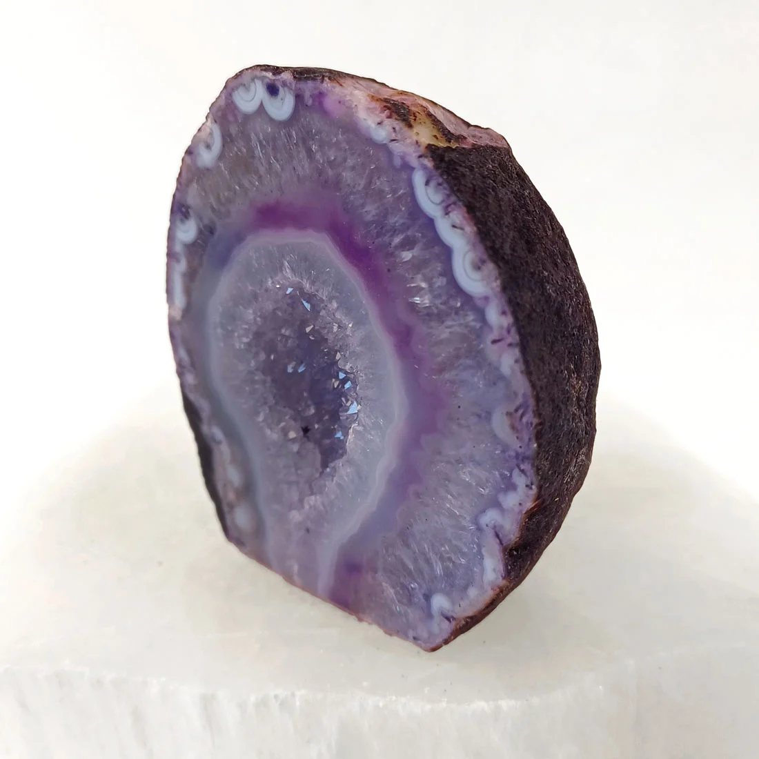 Agate cut to base in purple tones