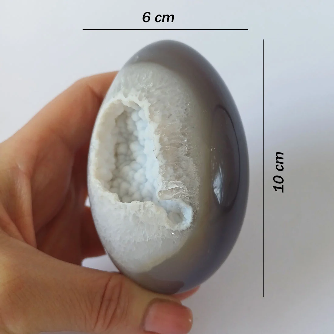 Polished Grey Agate Cosmic Egg with a natural botryoidal cavity formation