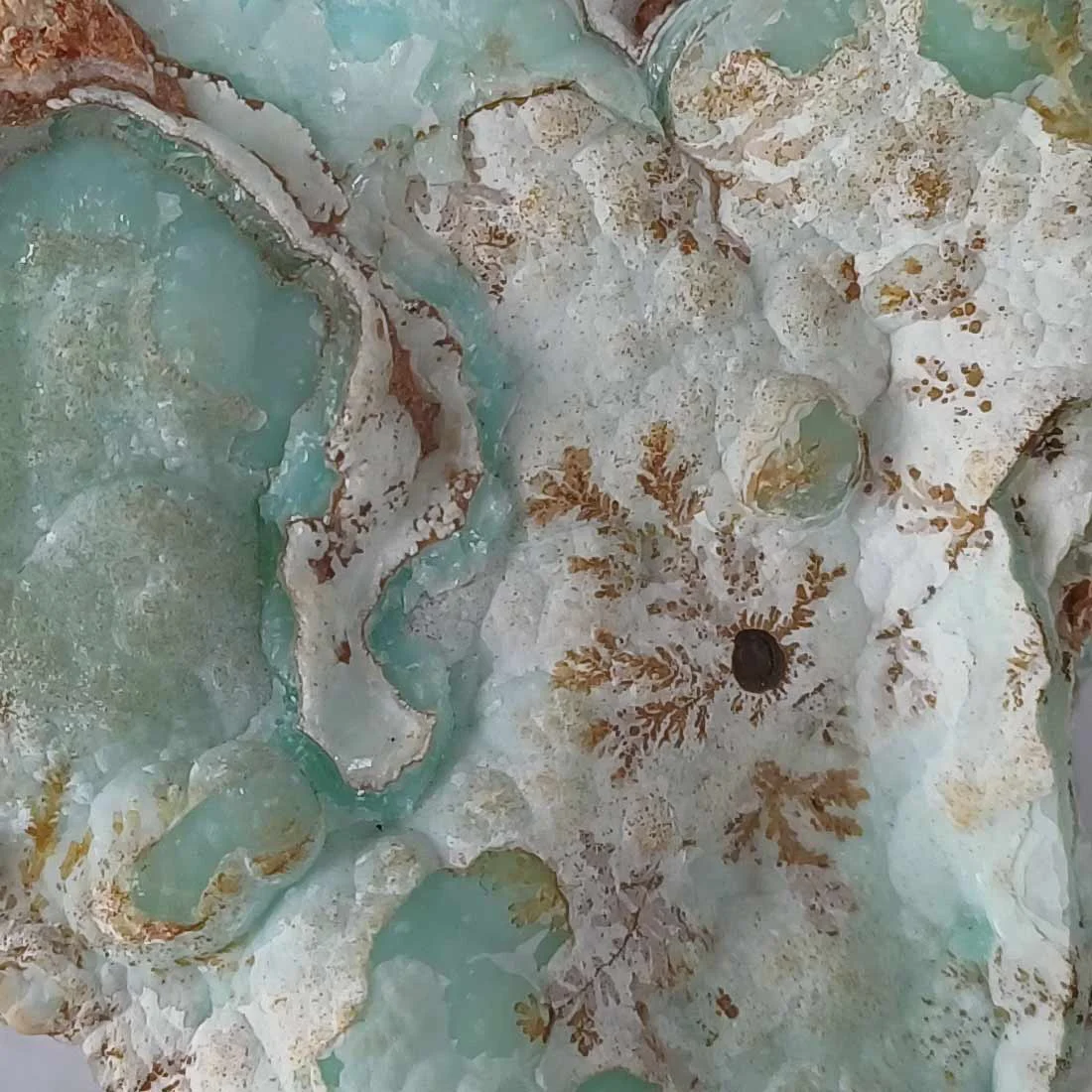 Smithsonite mineral specimen from the Lavrio Mines in Greece with natural carbonate formations and dendrite inclusion