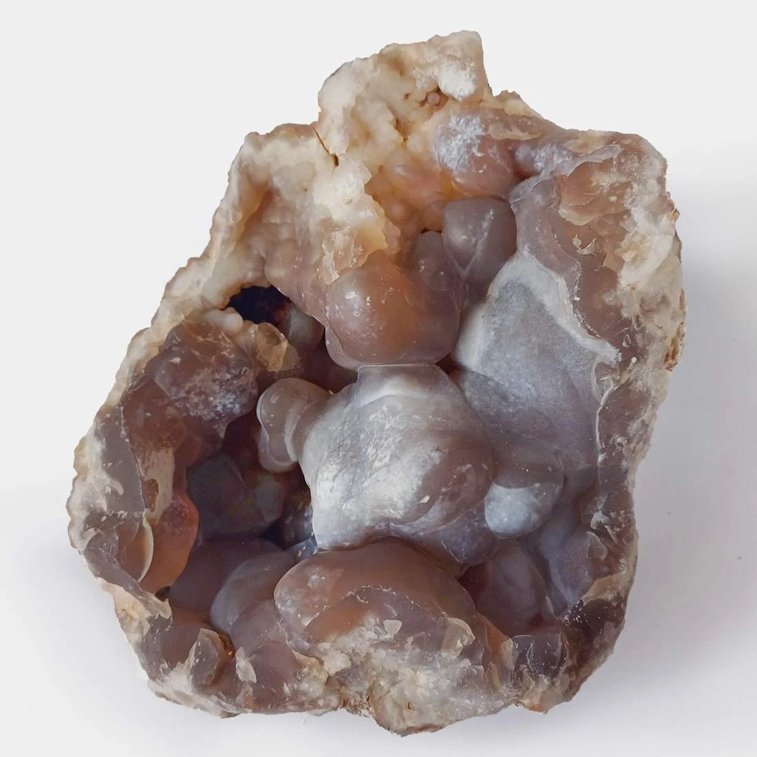 Natural chalcedony botryoidal geode with rounded grey and brown crystal formations and druzy texture