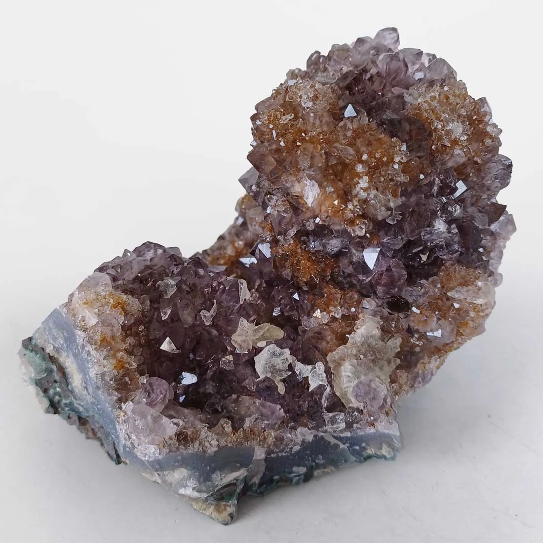 Natural Amethyst cluster with Citrine coloration and pine formations from Brazil featuring purple and golden Quartz crystals on matrix.