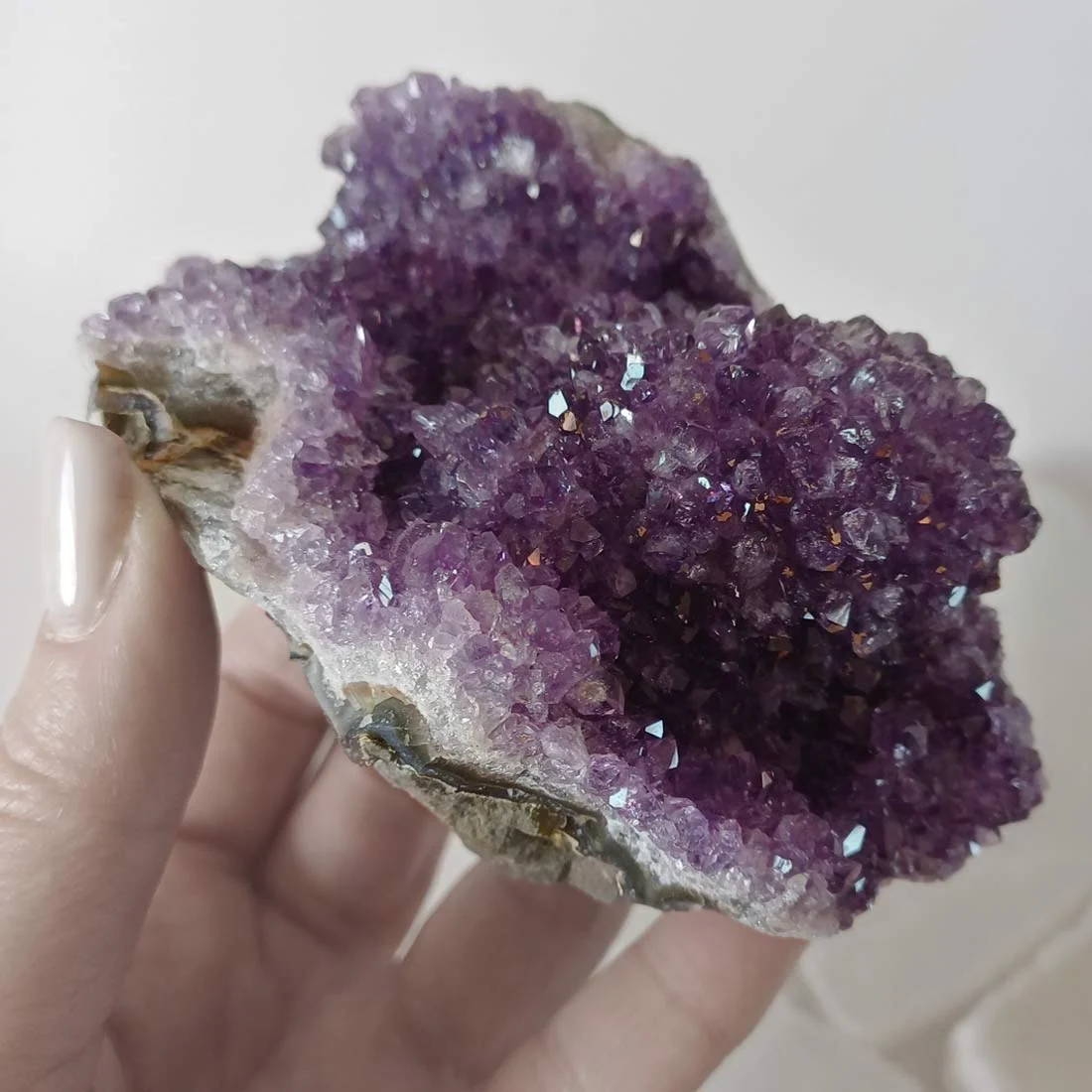 Premium Quality Amethyst Cluster from Brazil with deep purple crystal points, freestanding flat-cut base, natural rough formation, healing crystal specimen for home décor, meditation space, and crystal collection.