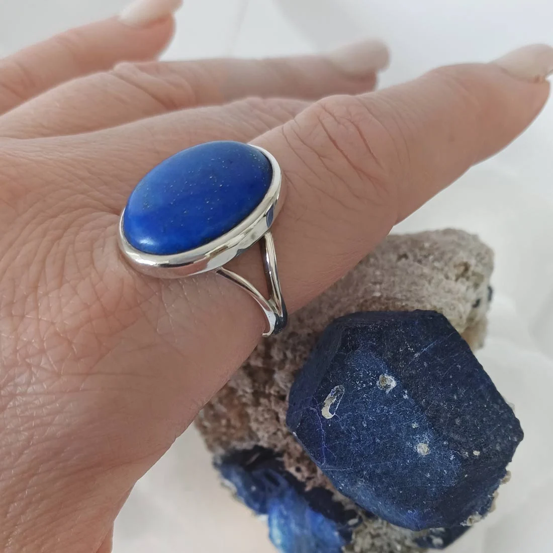 lapis lazuli ring, set in sterling silver and flecked with natural golden pyrite for a regal, timeless look.