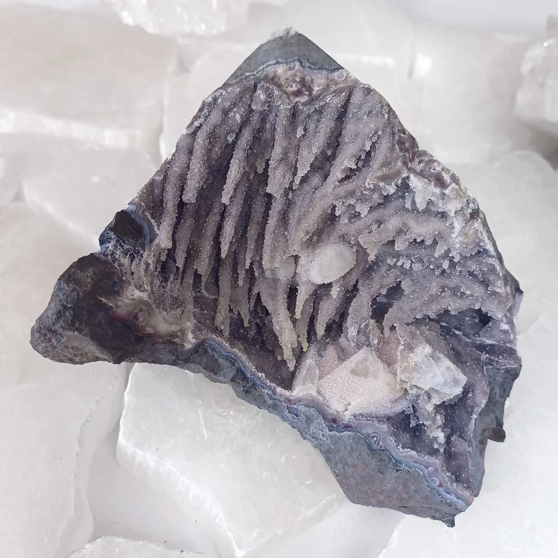 Amethyst Geode with greyish-violet stalactitic quartz growth, drusy crystals, calcite crystals and agate banding.