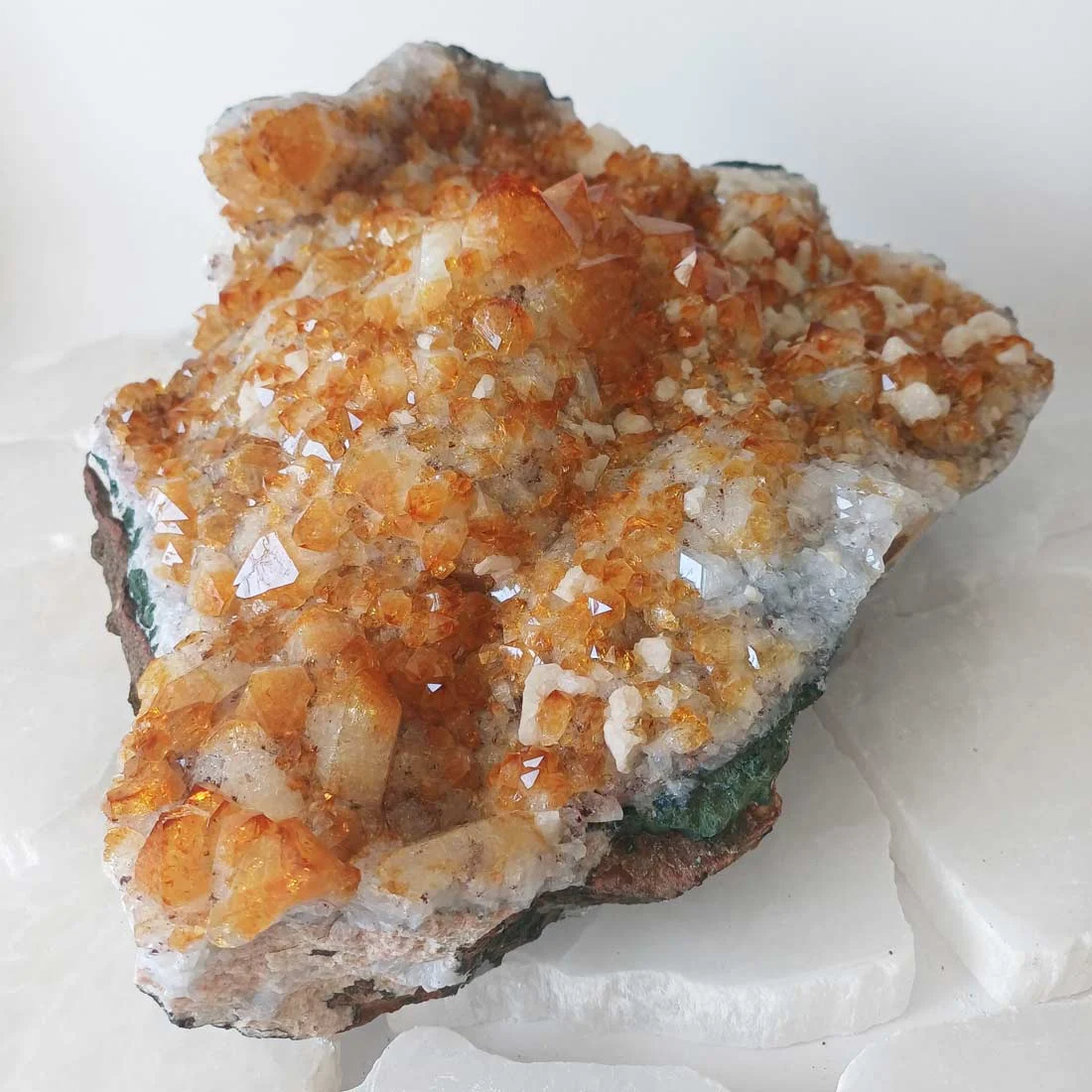 Large natural Citrine crystal cluster with multiple golden quartz points and white Calcite crystals.