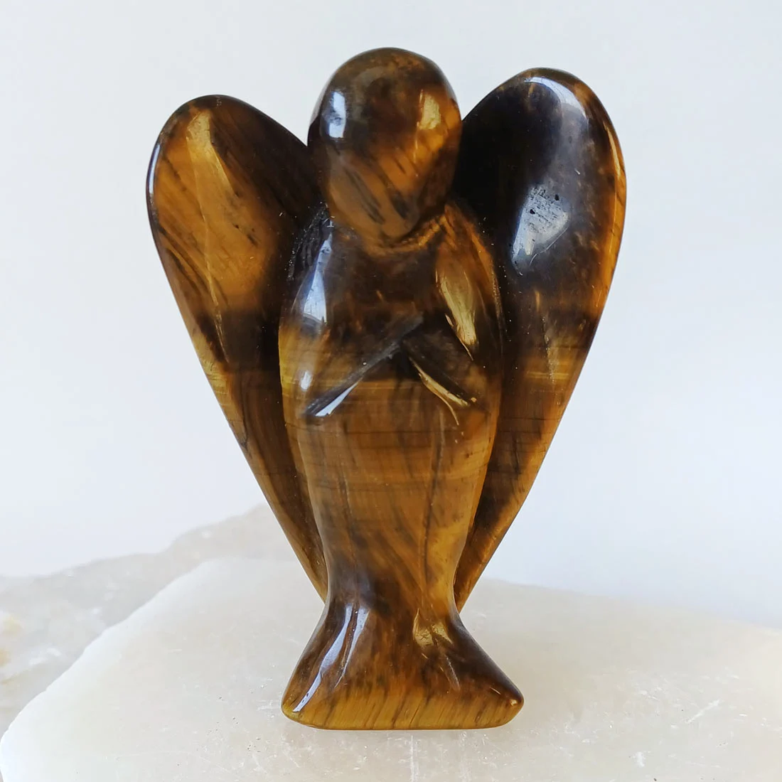 Tiger Eye Angel carved from natural golden-brown Tiger Eye crystal