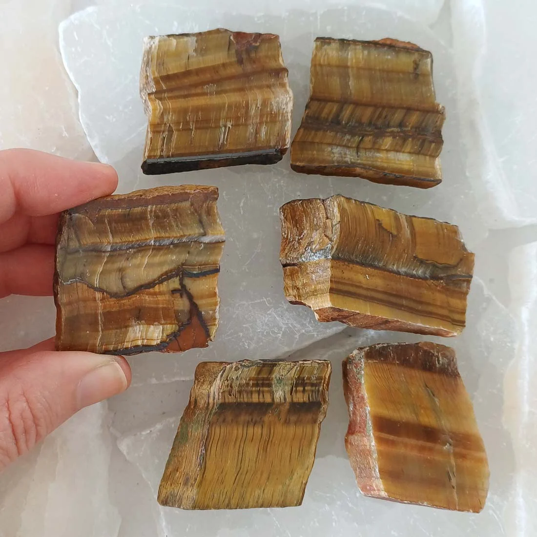 Tiger eye rough pieces - prehistoric treasures shop cyprus