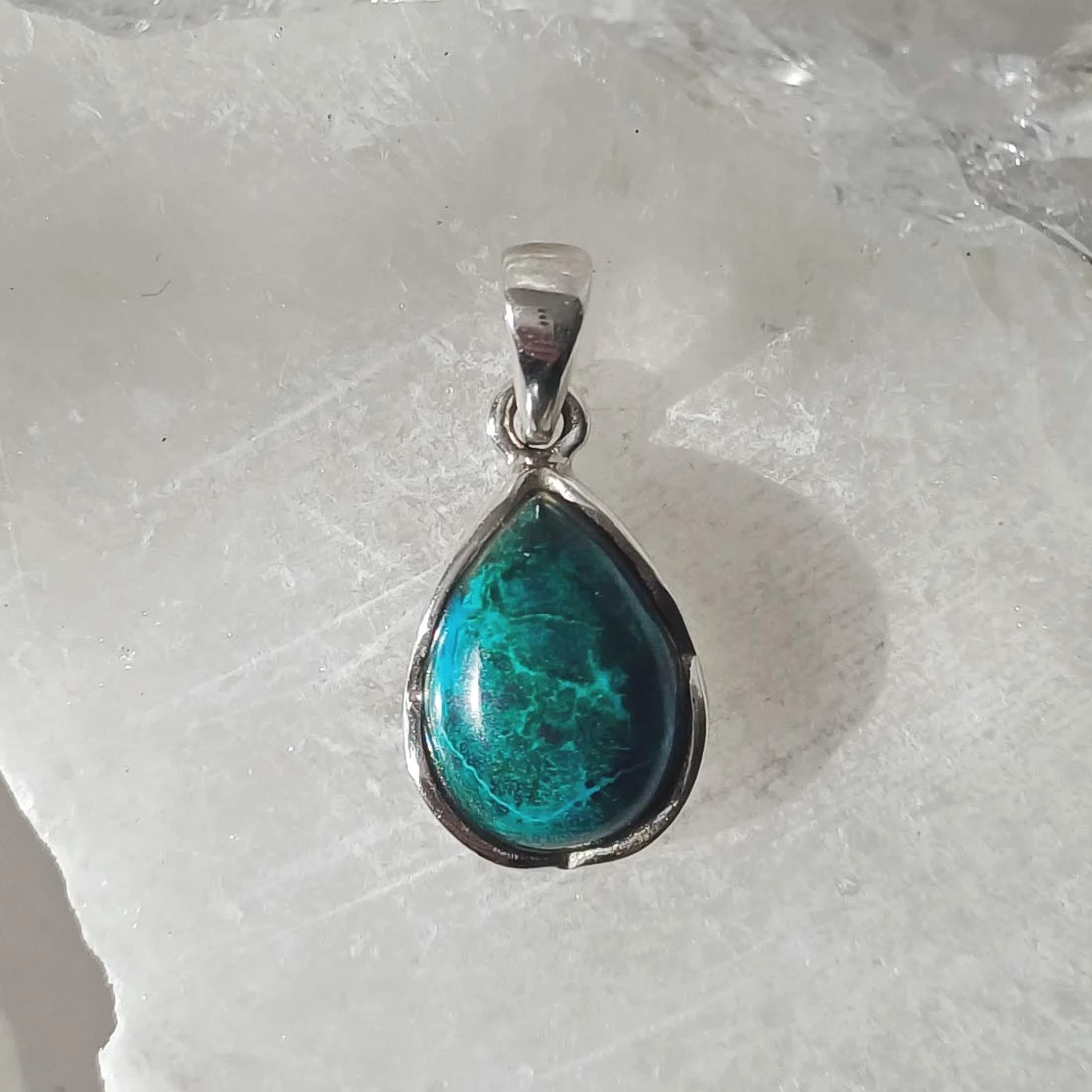 Chrysocolla drop shape pendant with natural blue-green stone set in 925 sterling silver