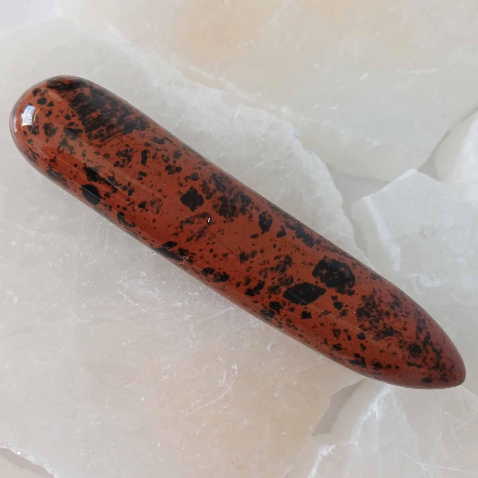 Polished Mahogany Obsidian wand with reddish-brown volcanic glass and natural black inclusions